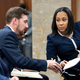 Fulton County District Attorney Fani Willis, right, talks with a member of her team during proceedings to seat a special purpose grand jury in Fulton County, Georgia, on Monday, May 2, 2022.